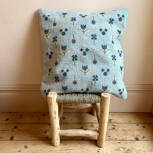 Hand-embroidered floral cushion cover