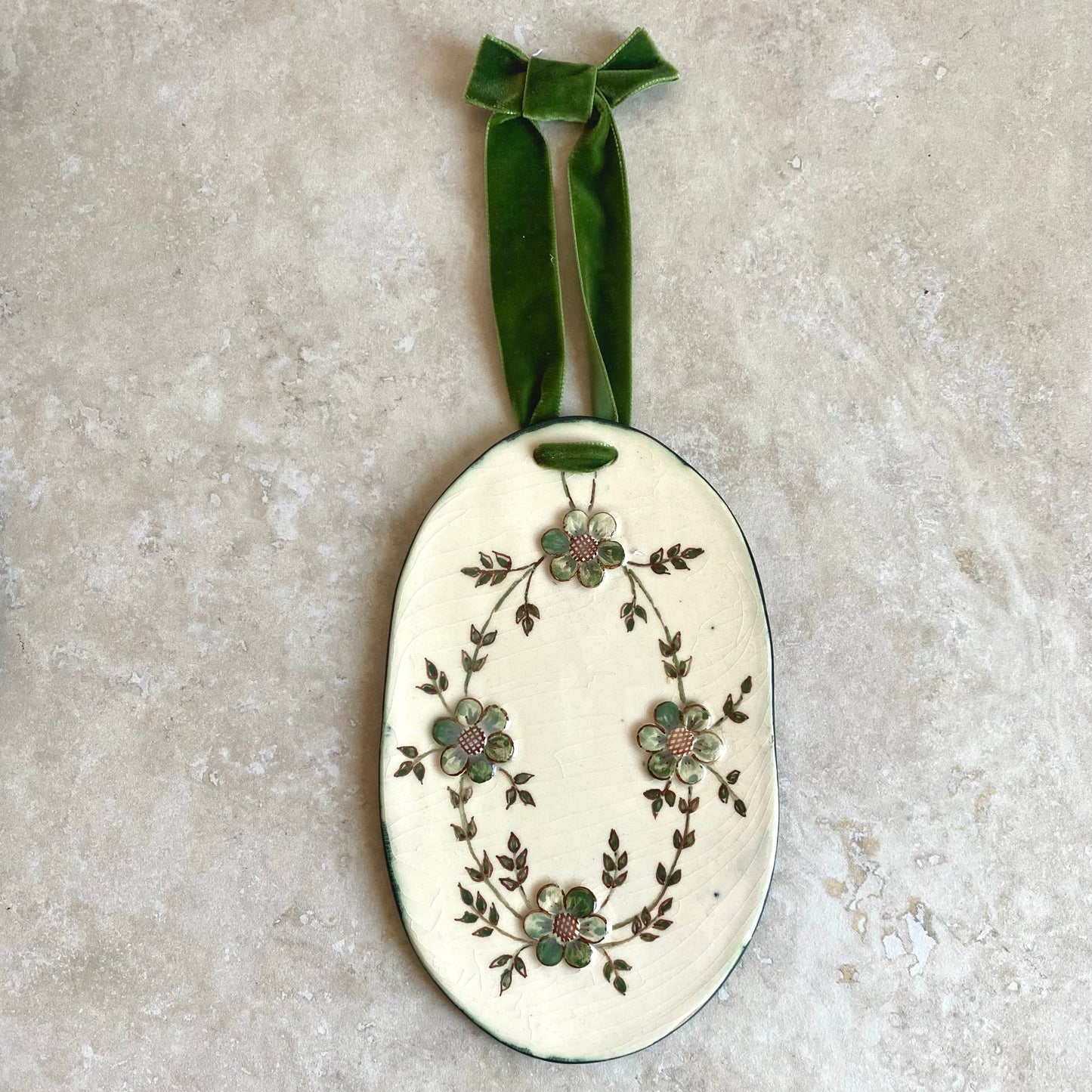 Handmade vintage floral ceramic wallhangings