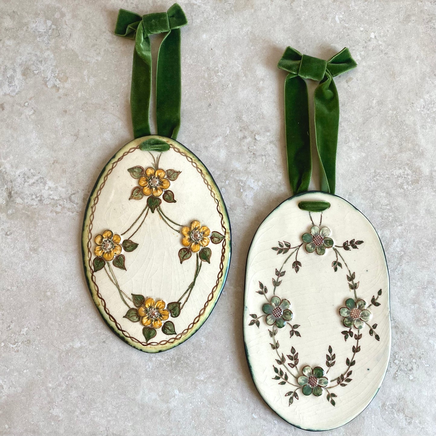 Handmade vintage floral ceramic wallhangings