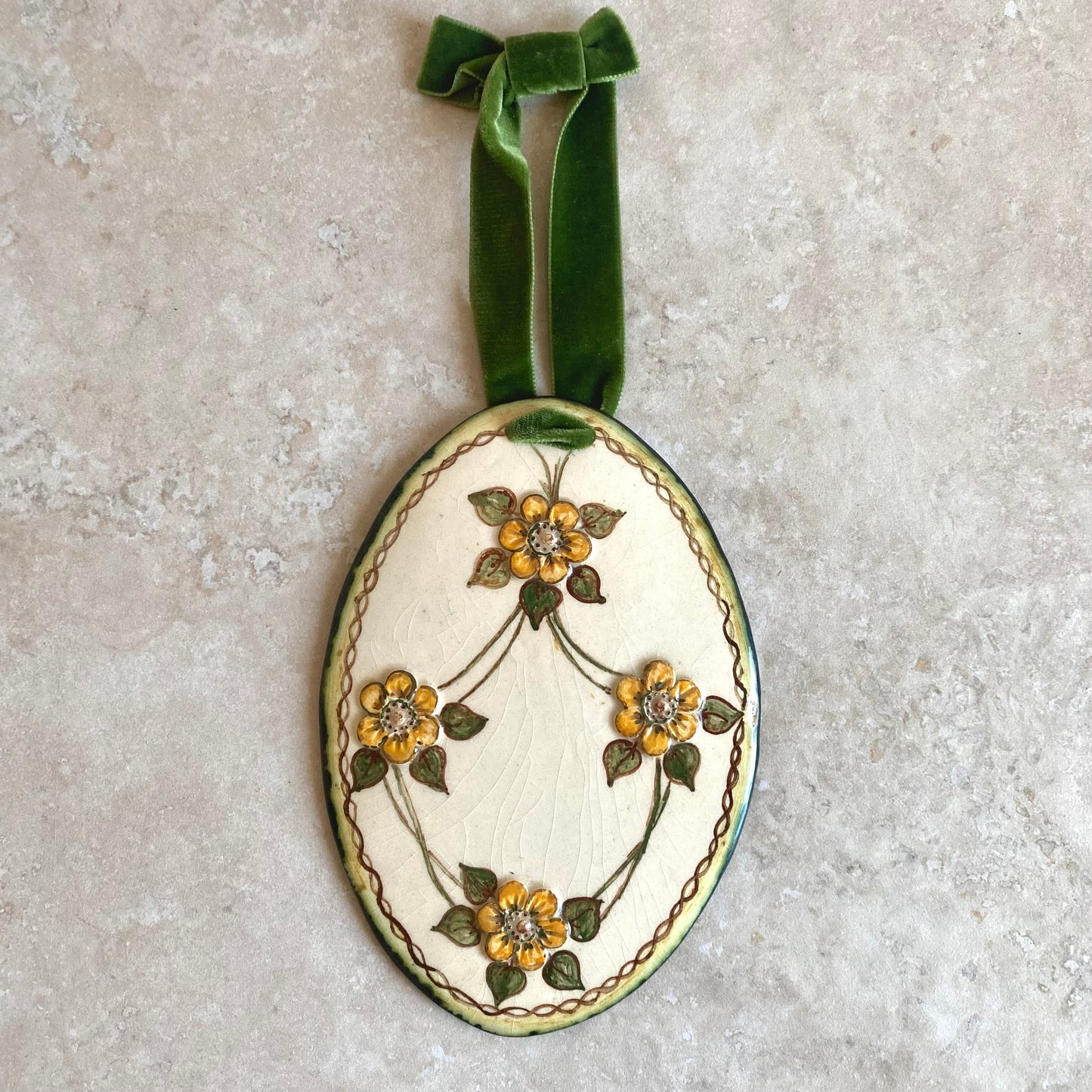Handmade vintage floral ceramic wallhangings