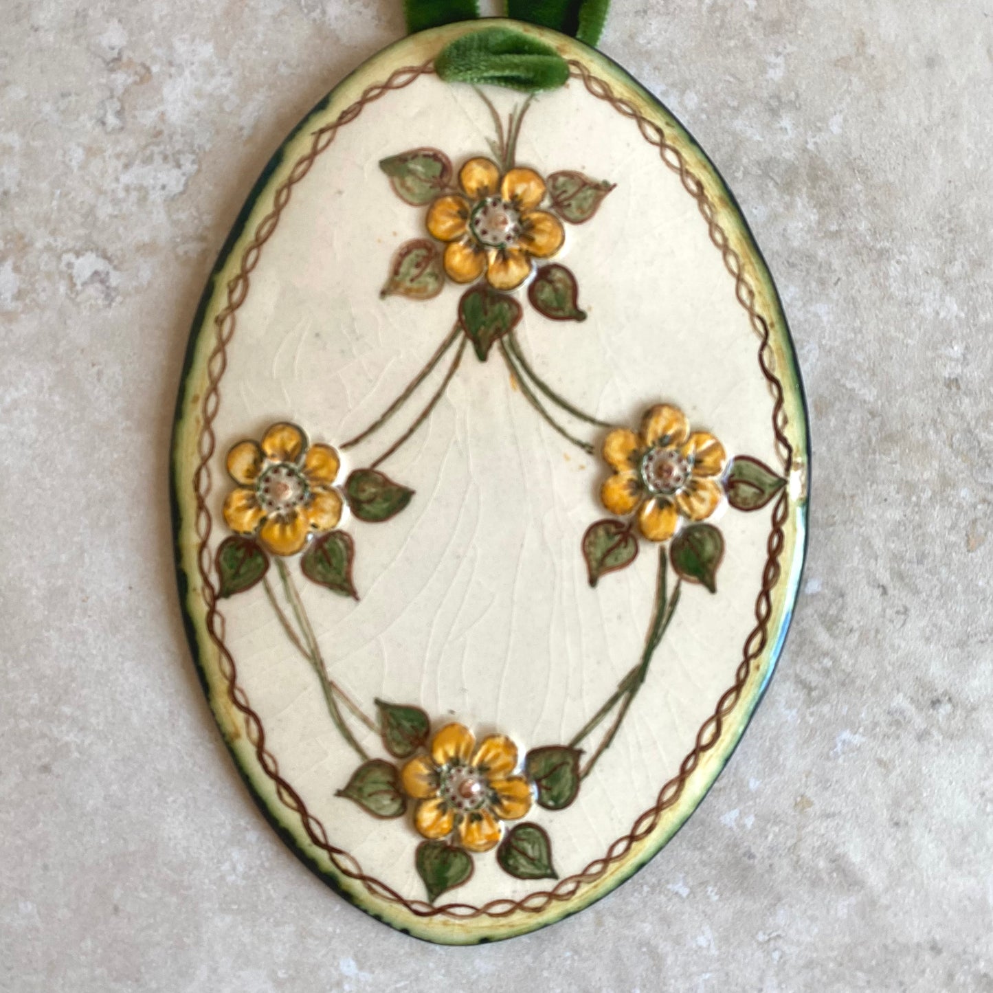 Handmade vintage floral ceramic wallhangings