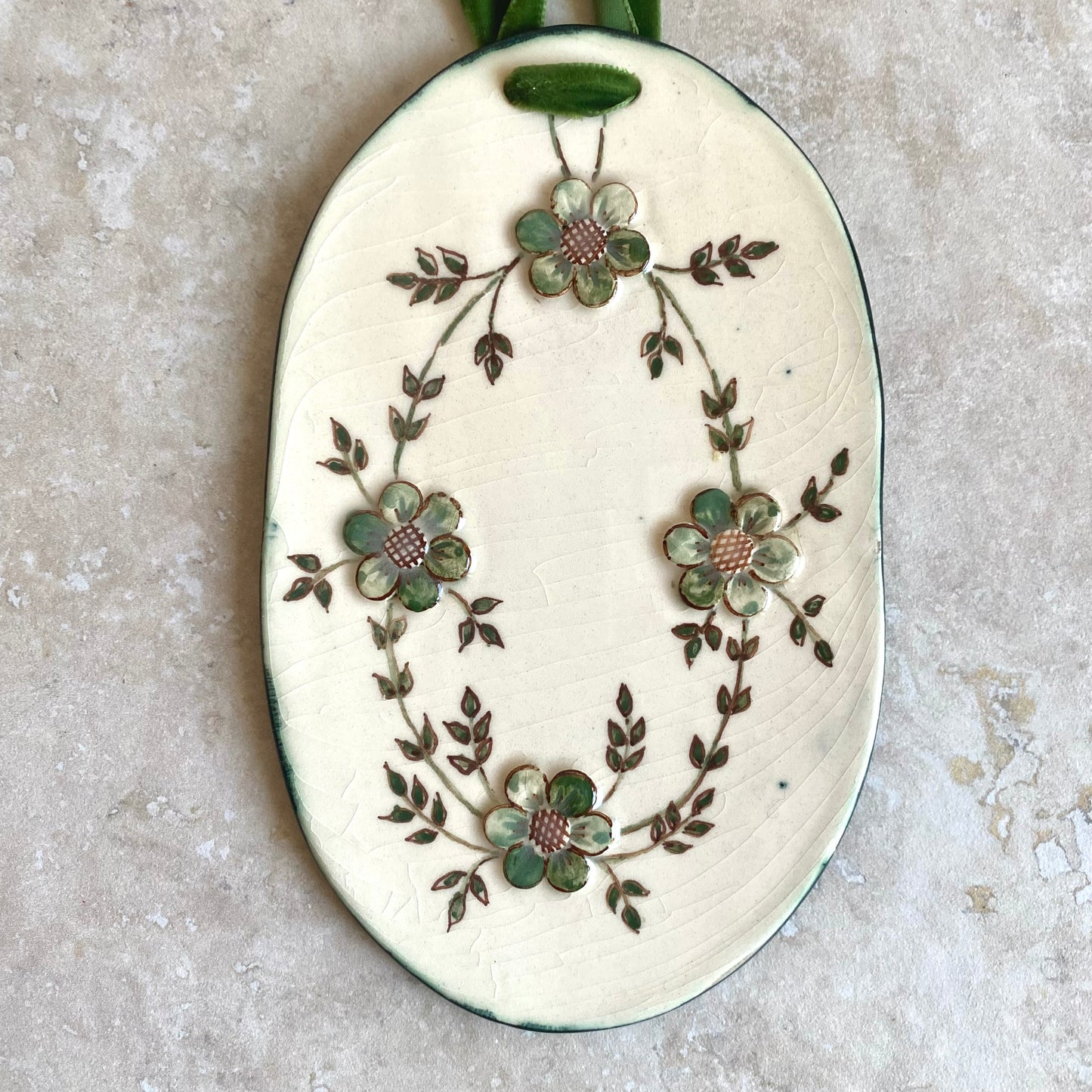 Handmade vintage floral ceramic wallhangings