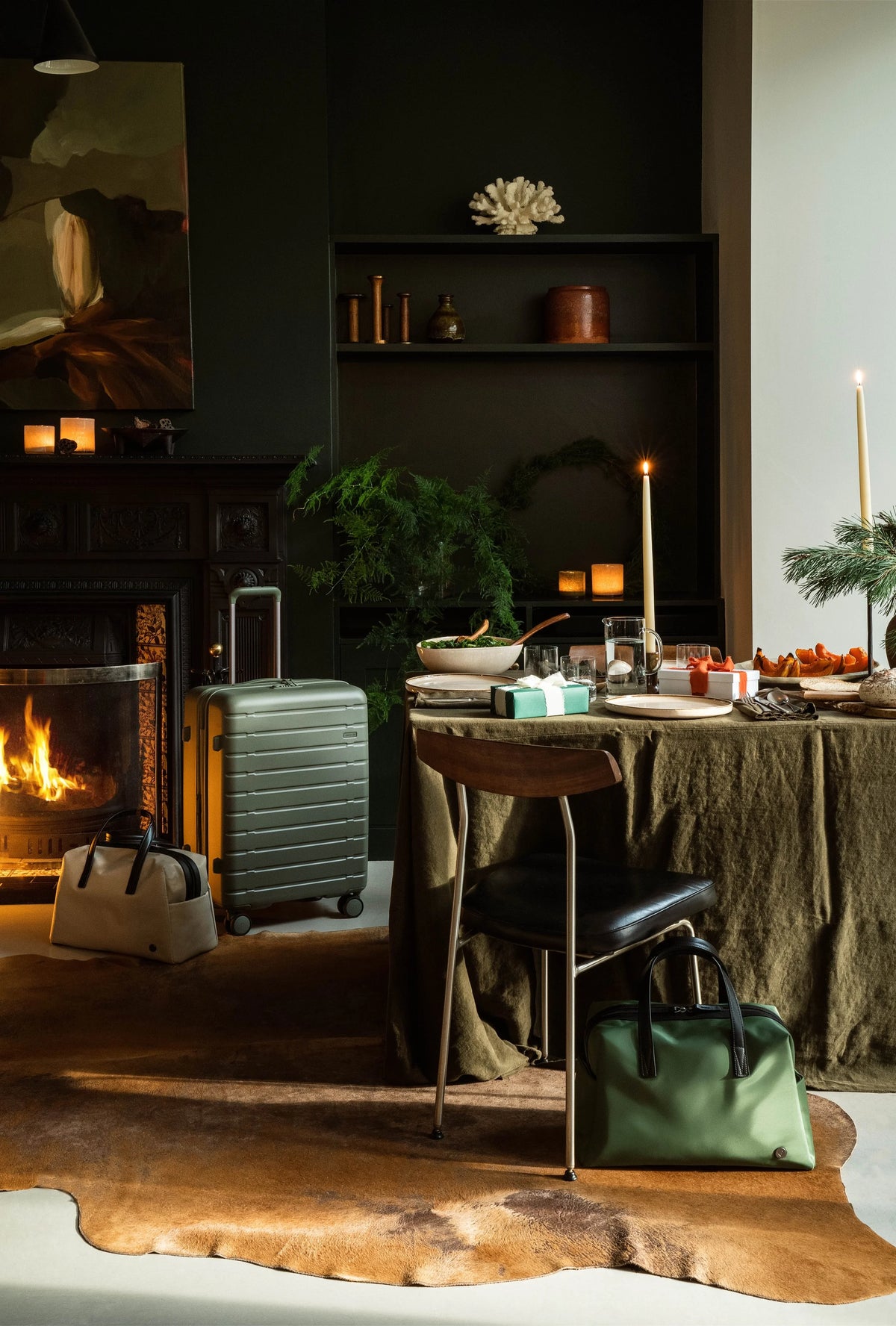 Creative styling by Ida Jacobsson-Wells for Antler Christmas campaign, featuring luggage in a styled interior setting