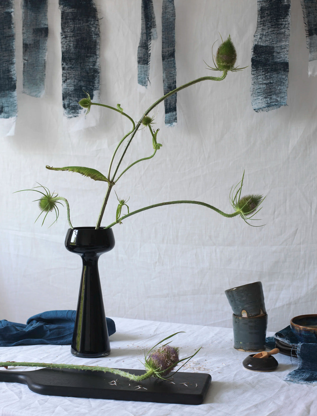 Still life and prop styling by Ida Jacobsson-Wells for Rakes Progress Magazine, featuring sculptural flowers and ceramics